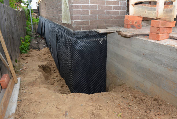 SJ Waterproofing Pros technician performing targeted Waterproofing assessment in Pullman, WA